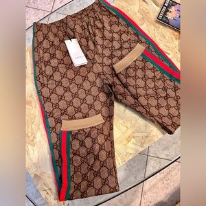 Gucci Men’s GG logo tech pants M brown monogram green red side stripe.